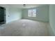 Spacious bedroom with large window and natural light at 261 Dahlia Dr, Woodstock, GA 30188