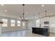 Bright dining area with chandelier and kitchen island at 261 Dahlia Dr, Woodstock, GA 30188