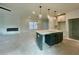 Modern kitchen with island, stainless steel appliances, and white cabinetry at 261 Dahlia Dr, Woodstock, GA 30188