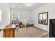 Bedroom with crib, desk, and large mirror; neutral walls at 3501 Great Sky Pkwy, Canton, GA 30114