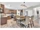 Bright dining area with kitchen views and hardwood floors at 3501 Great Sky Pkwy, Canton, GA 30114