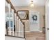 Entryway with staircase, hardwood floors, and a coat rack at 3501 Great Sky Pkwy, Canton, GA 30114