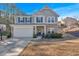 Two-story house with gray siding, brick accents, and a basketball goal at 3501 Great Sky Pkwy, Canton, GA 30114