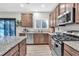 Kitchen features stainless steel appliances and granite countertops at 3501 Great Sky Pkwy, Canton, GA 30114