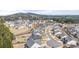Aerial view of a residential community with sidewalks, lush greenery, and a tennis court for active lifestyles at 5247 Flannery Chase Sw, Powder Springs, GA 30127