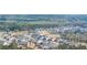An aerial view showing a neighborhood with a community pool, winding streets and neatly arranged homes at 5247 Flannery Chase Sw, Powder Springs, GA 30127