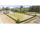 Community green space including benches, and meticulous landscaping providing a peaceful gathering spot at 5247 Flannery Chase Sw, Powder Springs, GA 30127