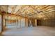 Unfinished basement area featuring concrete flooring and framed walls at 5247 Flannery Chase Sw, Powder Springs, GA 30127