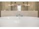 Relaxing bathroom with soaking tub and walk-in shower at 5247 Flannery Chase Sw, Powder Springs, GA 30127