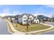 Two-story house, light colored brick, large windows, and a grassy yard at 5247 Flannery Chase Sw, Powder Springs, GA 30127