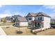 Stunning two-story home boasts a charming front porch and immaculate landscaping at 5247 Flannery Chase Sw, Powder Springs, GA 30127