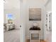 Hallway with view to the living room and another room with a built-in bookcase at 5247 Flannery Chase Sw, Powder Springs, GA 30127