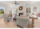 Bright living room featuring built-in shelves, fireplace, and comfortable seating at 5247 Flannery Chase Sw, Powder Springs, GA 30127