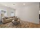 Cozy living room with hardwood floors, neutral walls, and a comfortable sofa with throw pillows at 5247 Flannery Chase Sw, Powder Springs, GA 30127