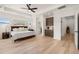 Comfortable main bedroom with hardwood floors, tray ceiling, and a coffee bar to enjoy the morning at 5247 Flannery Chase Sw, Powder Springs, GA 30127
