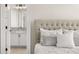 The main bedroom has neutral décor and a view to the connected bathroom at 5247 Flannery Chase Sw, Powder Springs, GA 30127
