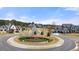 Landscaped roundabout at the entrance to Kyle Farm community at 5247 Flannery Chase Sw, Powder Springs, GA 30127