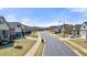 Well-manicured lawns and sidewalks line a quiet street of suburban homes on a sunny day at 5247 Flannery Chase Sw, Powder Springs, GA 30127