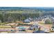 Aerial view of community pool with surrounding green space and houses at 5247 Flannery Chase Sw, Powder Springs, GA 30127