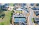 Aerial view of tennis courts near community pool and park at 5247 Flannery Chase Sw, Powder Springs, GA 30127