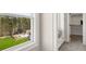 Window featuring a view to the neighborhood amenities including the pool and playground at 5247 Flannery Chase Sw, Powder Springs, GA 30127