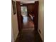 Hallway with wood paneled doors leading to living room at 4315 York Rd, Atlanta, GA 30337