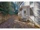Landscaped backyard with wooden retaining wall at 1325 Cameron Glen Dr, Marietta, GA 30062