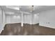 Finished basement with hardwood floors and columns at 1325 Cameron Glen Dr, Marietta, GA 30062