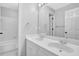 Bright bathroom with double vanity and shower/tub combo at 1325 Cameron Glen Dr, Marietta, GA 30062