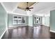 Spacious bedroom with hardwood floors and a tray ceiling at 1325 Cameron Glen Dr, Marietta, GA 30062