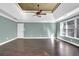 Large bedroom with hardwood floors and a ceiling fan at 1325 Cameron Glen Dr, Marietta, GA 30062