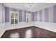 Charming bedroom with hardwood floors and purple walls at 1325 Cameron Glen Dr, Marietta, GA 30062