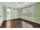 Light and airy bedroom with dark hardwood floors at 1325 Cameron Glen Dr, Marietta, GA 30062