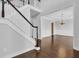 Two-story entryway with hardwood floors and a view of the dining room at 1325 Cameron Glen Dr, Marietta, GA 30062