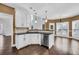L-shaped kitchen with an island and stainless steel appliances at 1325 Cameron Glen Dr, Marietta, GA 30062