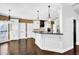 Elegant kitchen with white cabinets, granite counters, and stainless steel appliances at 1325 Cameron Glen Dr, Marietta, GA 30062