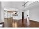 Open floor plan living room with kitchen and hardwood floors at 1325 Cameron Glen Dr, Marietta, GA 30062