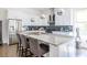 Modern kitchen with white cabinets and granite countertop island at 165 Mayson Ne Ave, Atlanta, GA 30307