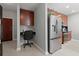 Kitchen features built-in desk and stainless steel refrigerator at 400 W Peachtree Nw St # 3611, Atlanta, GA 30308