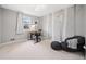 Bright bedroom with a playful accent wall, cozy furniture, and a comfortable workspace at 749 Scarlet Ne Dr, Kennesaw, GA 30144