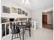 Cozy dining area enhanced with unique wall decor, perfect for casual meals and intimate gatherings at 749 Scarlet Ne Dr, Kennesaw, GA 30144