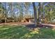 Backyard view with detached shed and a tire swing under a tree at 2460 Oldfield Rd, Atlanta, GA 30327