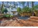 Charming backyard with patio, fire pit, and pergola at 2460 Oldfield Rd, Atlanta, GA 30327