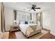 Bright bedroom with hardwood floors and ceiling fan at 2460 Oldfield Rd, Atlanta, GA 30327