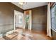 Formal dining room with hardwood floors and large windows at 2460 Oldfield Rd, Atlanta, GA 30327