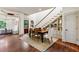 Elegant dining room featuring hardwood floors and built-in shelves at 2460 Oldfield Rd, Atlanta, GA 30327