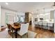 Modern kitchen with island, stainless steel appliances, and hardwood floors at 2460 Oldfield Rd, Atlanta, GA 30327