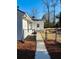 View of the backyard showing a rockery and a fenced-in yard at 2622 Marcia Dr, Lawrenceville, GA 30044