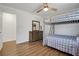 This bedroom features a bunk bed, wood floors, and natural lighting at 2622 Marcia Dr, Lawrenceville, GA 30044