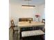 Dining room featuring a modern chandelier and a decorative bench at 2622 Marcia Dr, Lawrenceville, GA 30044